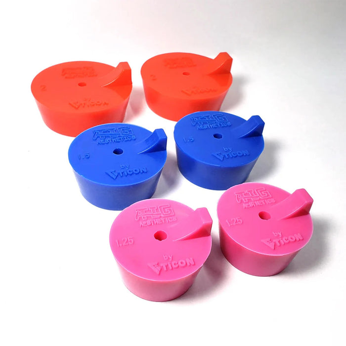 Tig Aesthetics Turbo Manifold Purge Plug Kit featuring high-temp silicone plugs in magenta, blue, and red, stainless steel mesh diffusers, and titanium argon inlet tubes for efficient and turbulence-free back purging in welding applications.