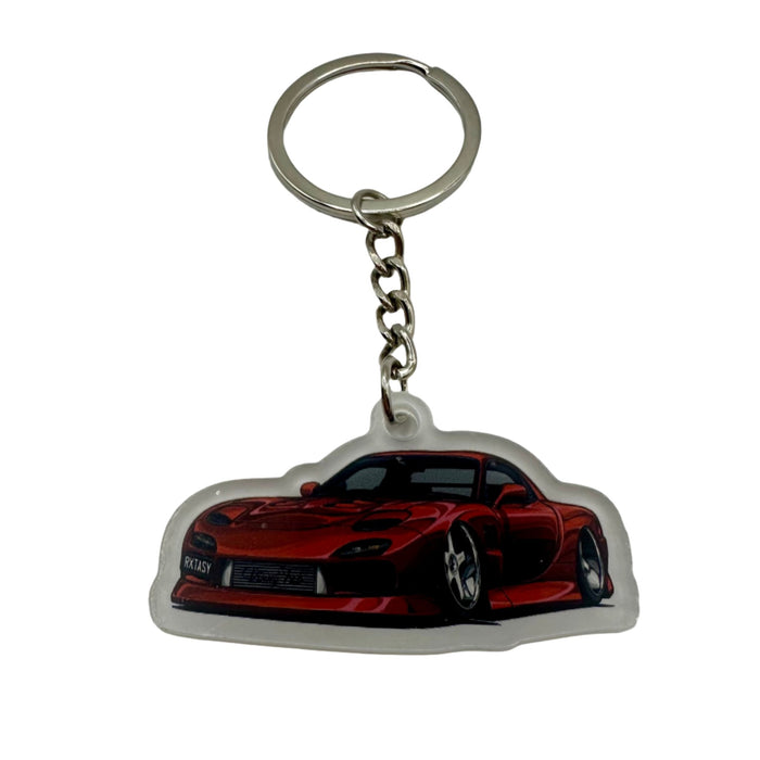 Limited edition collection featuring Vinny Fab's favourite builds, including Dan's incredible 22-year-long Mazda RX-7 RXTASY build. Includes the RXTASY Mazda RX-7 key chain for easy key identification.
