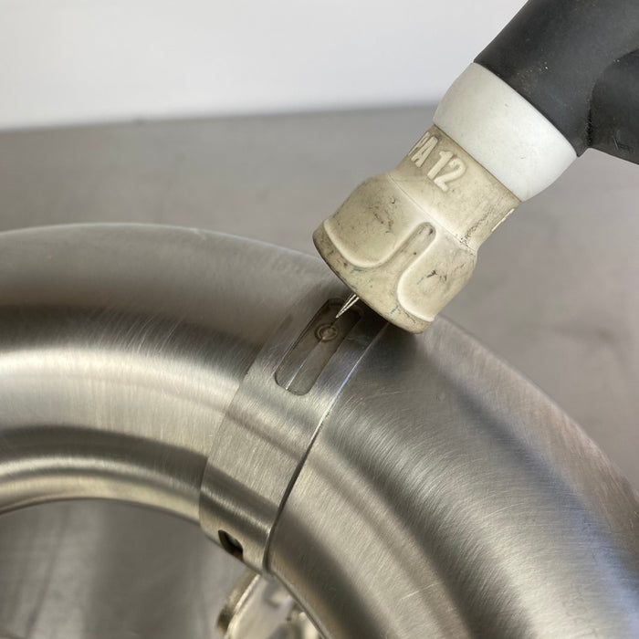Slim stainless tacking bands holding pipe bends for welding